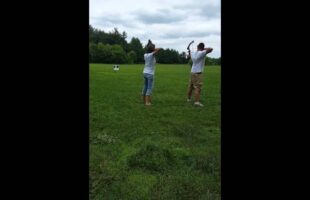 Hunting style gender reveal with balloons and bows