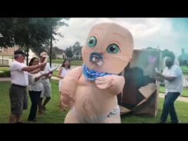 Giant dancing baby gender reveal