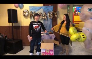 Giant baby surprised in the baby gender reveal