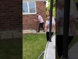 Lad drops football at gender reveal