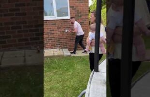 Lad drops football at gender reveal